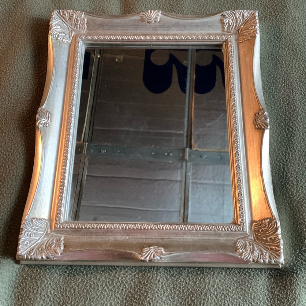 Melannco antiqued silver mirrored decorative tray.  Approximately 13” x 11”